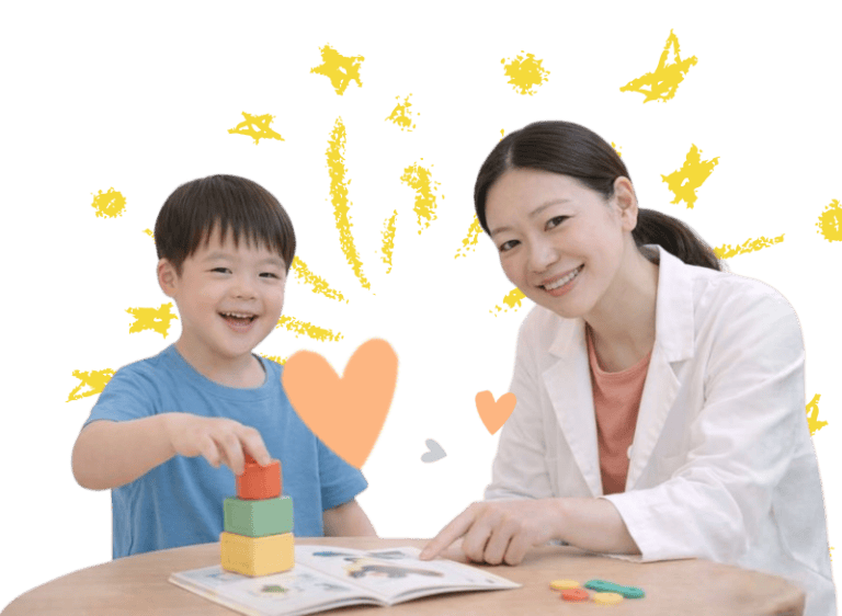 Speech therapy session with a child with Down syndrome and therapist.