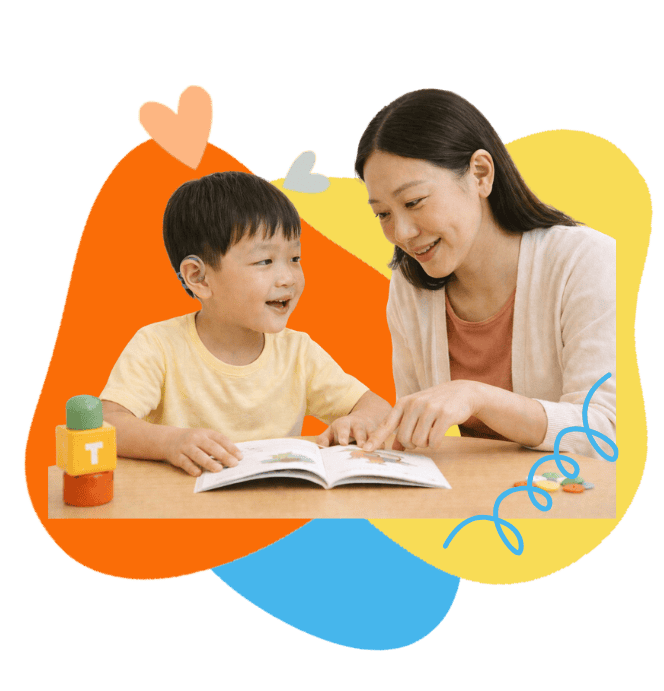 Child with hearing loss engaging in speech therapy with therapist.