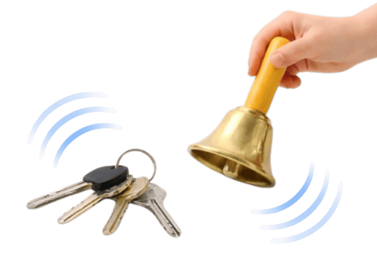 Hand holding a bell for auditory training and listening therapy exercises.