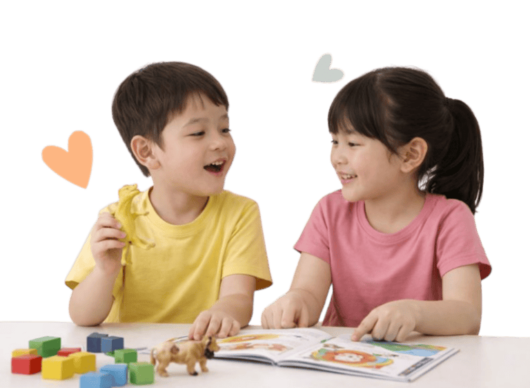 Happy children engaging in speech therapy activities with toys and books.